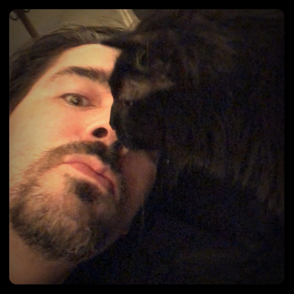 This is my cat kissing me on the face...